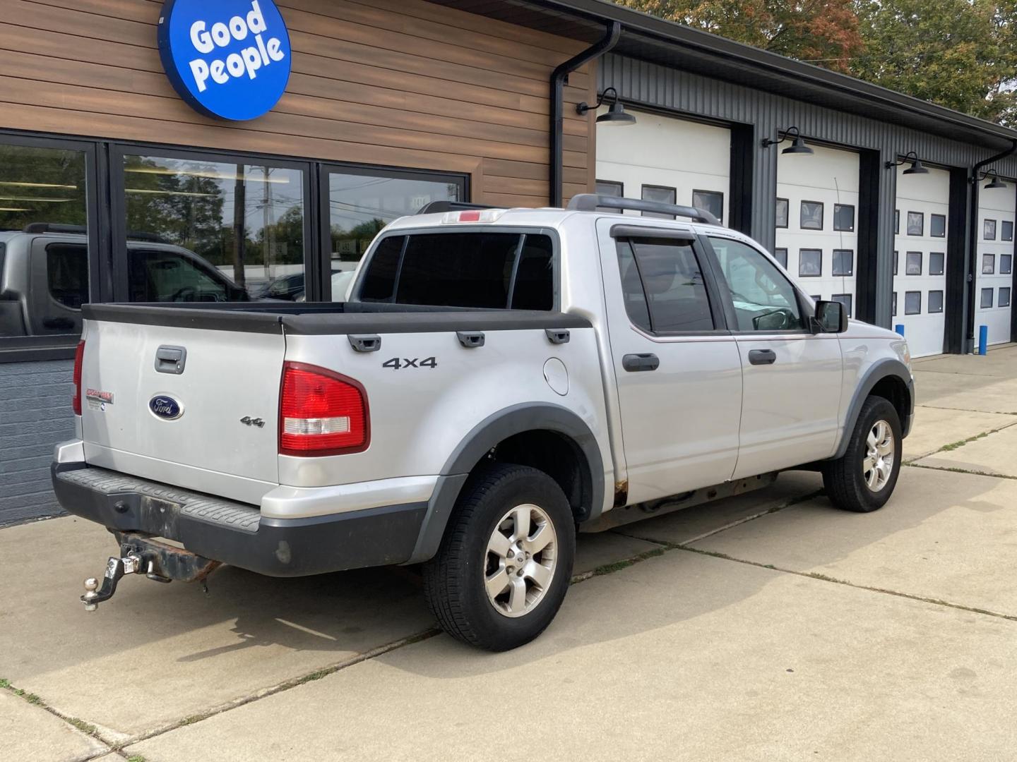 2010 Silver Ford Explorer Sport Trac XLT 4.0L 4WD (1FMEU5BE4AU) with an 4.0L V6 SOHC 12V engine, 5-Speed Automatic transmission, located at 1800 South Ihm Blvd, Freeport, IL, 61032, (815) 232-5543, 42.278645, -89.607994 - Explorer Sport Trac XLT 4D SUV 4WD - Photo#1