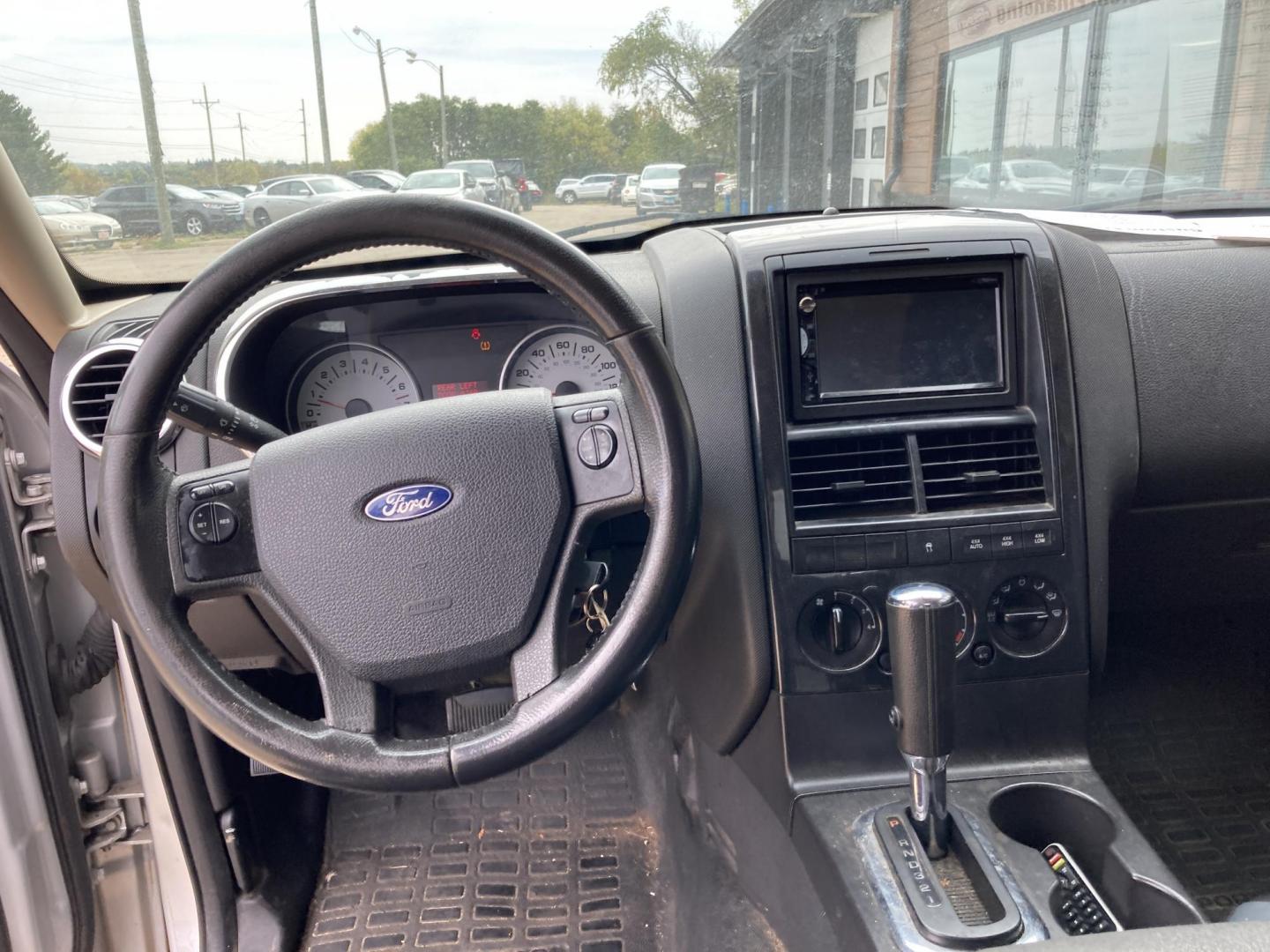2010 Silver Ford Explorer Sport Trac XLT 4.0L 4WD (1FMEU5BE4AU) with an 4.0L V6 SOHC 12V engine, 5-Speed Automatic transmission, located at 1800 South Ihm Blvd, Freeport, IL, 61032, (815) 232-5543, 42.278645, -89.607994 - Explorer Sport Trac XLT 4D SUV 4WD - Photo#5