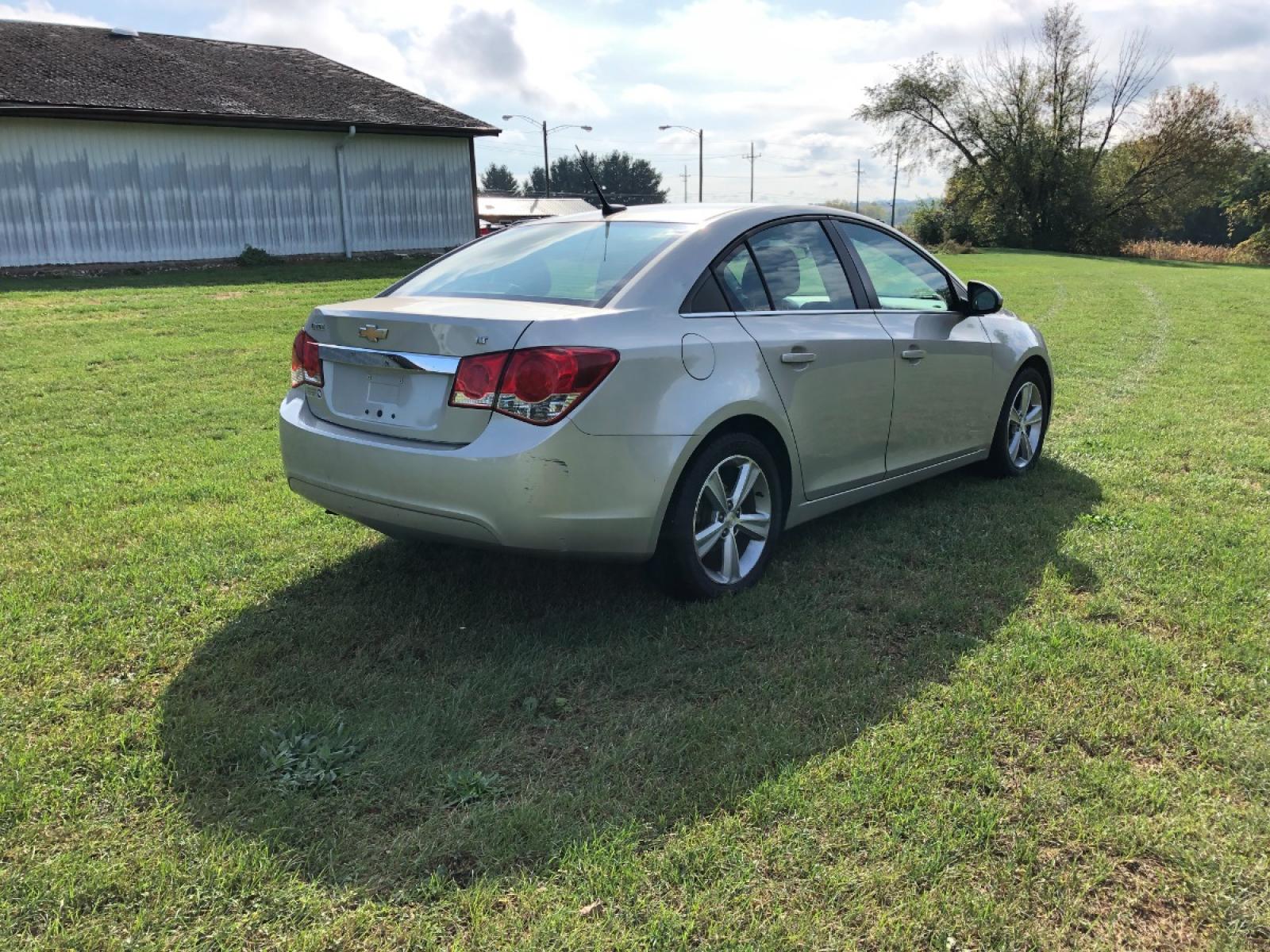 2013 Light Almond Chevrolet Cruze 2LT Auto (1G1PE5SB9D7) with an 1.4L L4 DOHC 16V TURBO engine, 6-Speed Automatic transmission, located at 1800 South Ihm Blvd, Freeport, IL, 61032, (815) 232-5543, 42.278645, -89.607994 - Photo #2