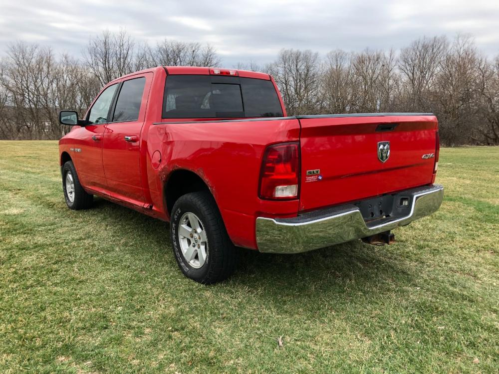 2009 Indy Red Dodge Ram 1500 SLT Crew Cab 4WD (1D3HV13T59J) with an 5.7L V8 OHV 16V engine, 5-Speed Automatic transmission, located at 1800 South Ihm Blvd, Freeport, IL, 61032, (815) 232-5543, 42.278645, -89.607994 - Ram 1500 SLT Crew Cab 4WD - Photo #1