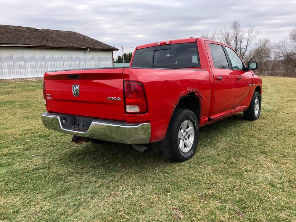2009 Indy Red Dodge Ram 1500 SLT Crew Cab 4WD (1D3HV13T59J) with an 5.7L V8 OHV 16V engine, 5-Speed Automatic transmission, located at 1800 South Ihm Blvd, Freeport, IL, 61032, (815) 232-5543, 42.278645, -89.607994 - Ram 1500 SLT Crew Cab 4WD - Photo #2