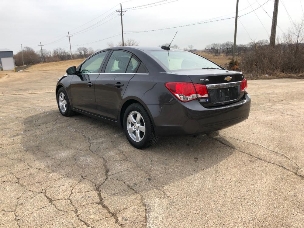 2015 Dark Graphite Met Chevrolet Cruze 1LT Auto (1G1PC5SBXF7) with an 1.4L L4 DOHC 16V TURBO engine, 6-Speed Automatic transmission, located at 1800 South Ihm Blvd, Freeport, IL, 61032, (815) 232-5543, 42.278645, -89.607994 - Photo #1