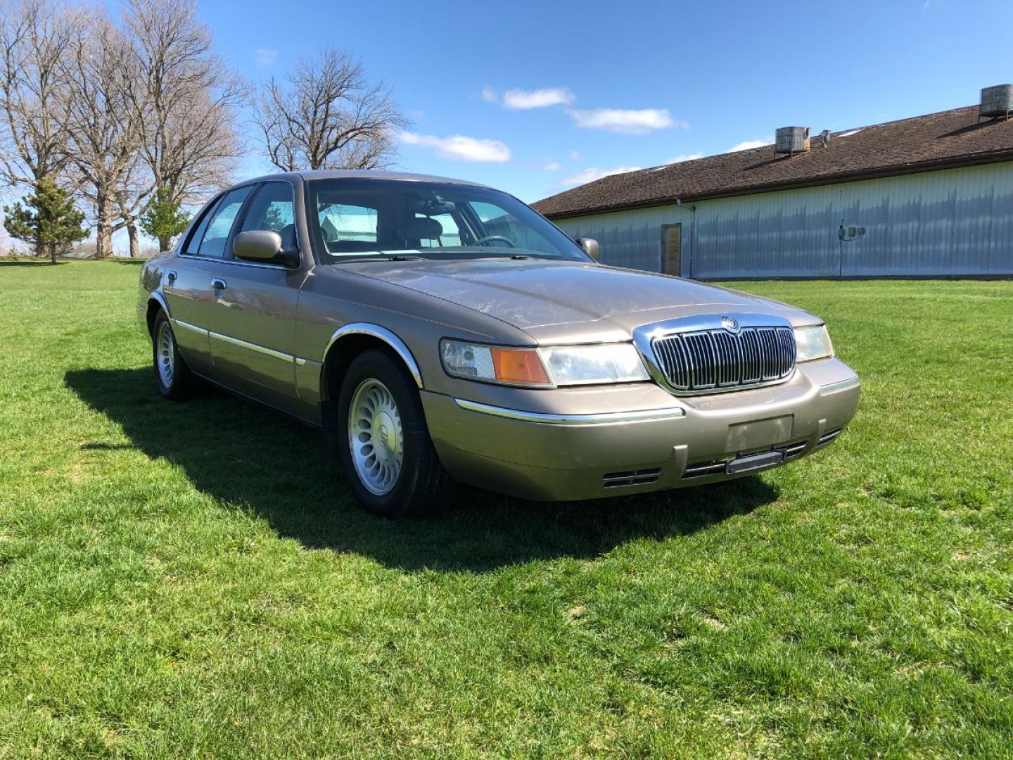 2002 Arizona Beige Met Mercury Grand Marquis LS Premium (2MEFM75W22X) with an 4.6L V8 SOHC 16V engine, 4-Speed Automatic Overdrive transmission, located at 1800 South Ihm Blvd, Freeport, IL, 61032, (815) 232-5543, 42.278645, -89.607994 - Photo#2