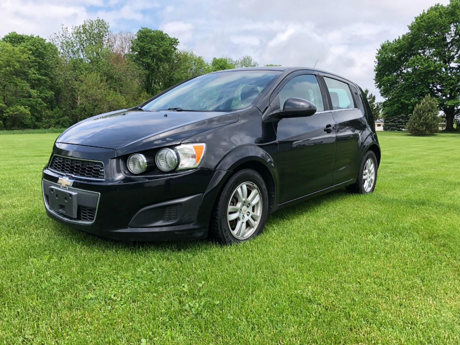 2012 Black Chevrolet Sonic 2LT 5-Door (1G1JC6SH2C4) with an 1.8L L4 DOHC 24V FFV engine, 6-Speed Automatic transmission, located at 1800 South Ihm Blvd, Freeport, IL, 61032, (815) 232-5543, 42.278645, -89.607994 - Photo #0