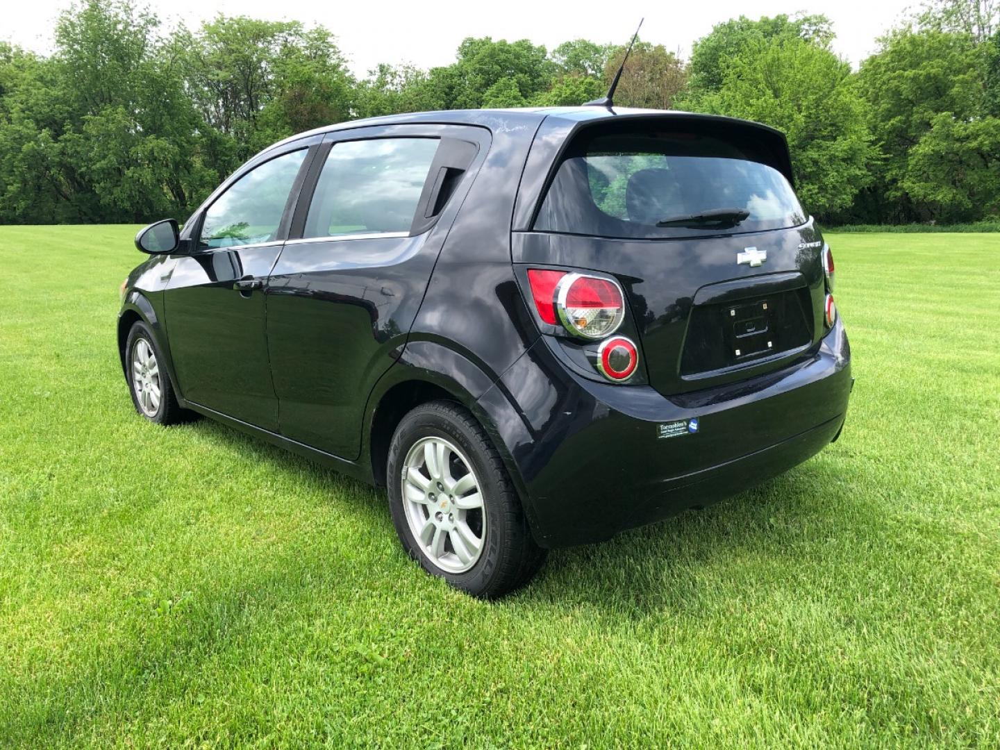 2012 Black Chevrolet Sonic 2LT 5-Door (1G1JC6SH2C4) with an 1.8L L4 DOHC 24V FFV engine, 6-Speed Automatic transmission, located at 1800 South Ihm Blvd, Freeport, IL, 61032, (815) 232-5543, 42.278645, -89.607994 - Sonic LT 4D Hatchback - Photo#1