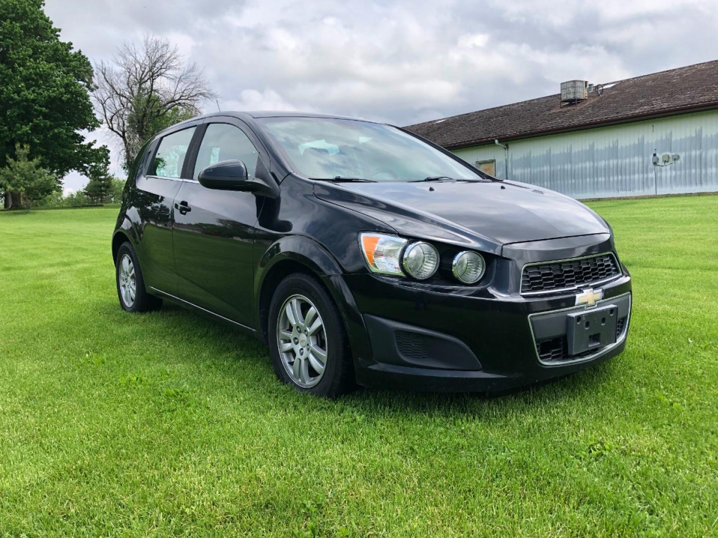 2012 Black Chevrolet Sonic 2LT 5-Door (1G1JC6SH2C4) with an 1.8L L4 DOHC 24V FFV engine, 6-Speed Automatic transmission, located at 1800 South Ihm Blvd, Freeport, IL, 61032, (815) 232-5543, 42.278645, -89.607994 - Sonic LT 4D Hatchback - Photo#3
