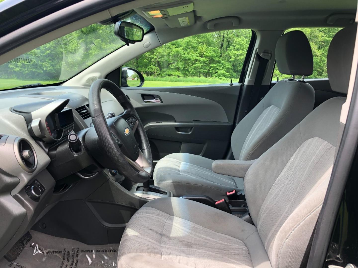 2012 Black Chevrolet Sonic 2LT 5-Door (1G1JC6SH2C4) with an 1.8L L4 DOHC 24V FFV engine, 6-Speed Automatic transmission, located at 1800 South Ihm Blvd, Freeport, IL, 61032, (815) 232-5543, 42.278645, -89.607994 - Sonic LT 4D Hatchback - Photo#4