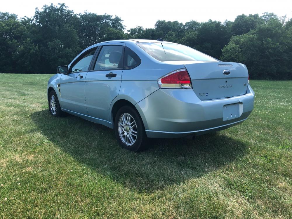 2008 Ice Blue Met Ford Focus SES Sedan (1FAHP35N78W) with an 2.0L L4 DOHC 16V engine, located at 1800 South Ihm Blvd, Freeport, IL, 61032, (815) 232-5543, 42.278645, -89.607994 - Photo #1