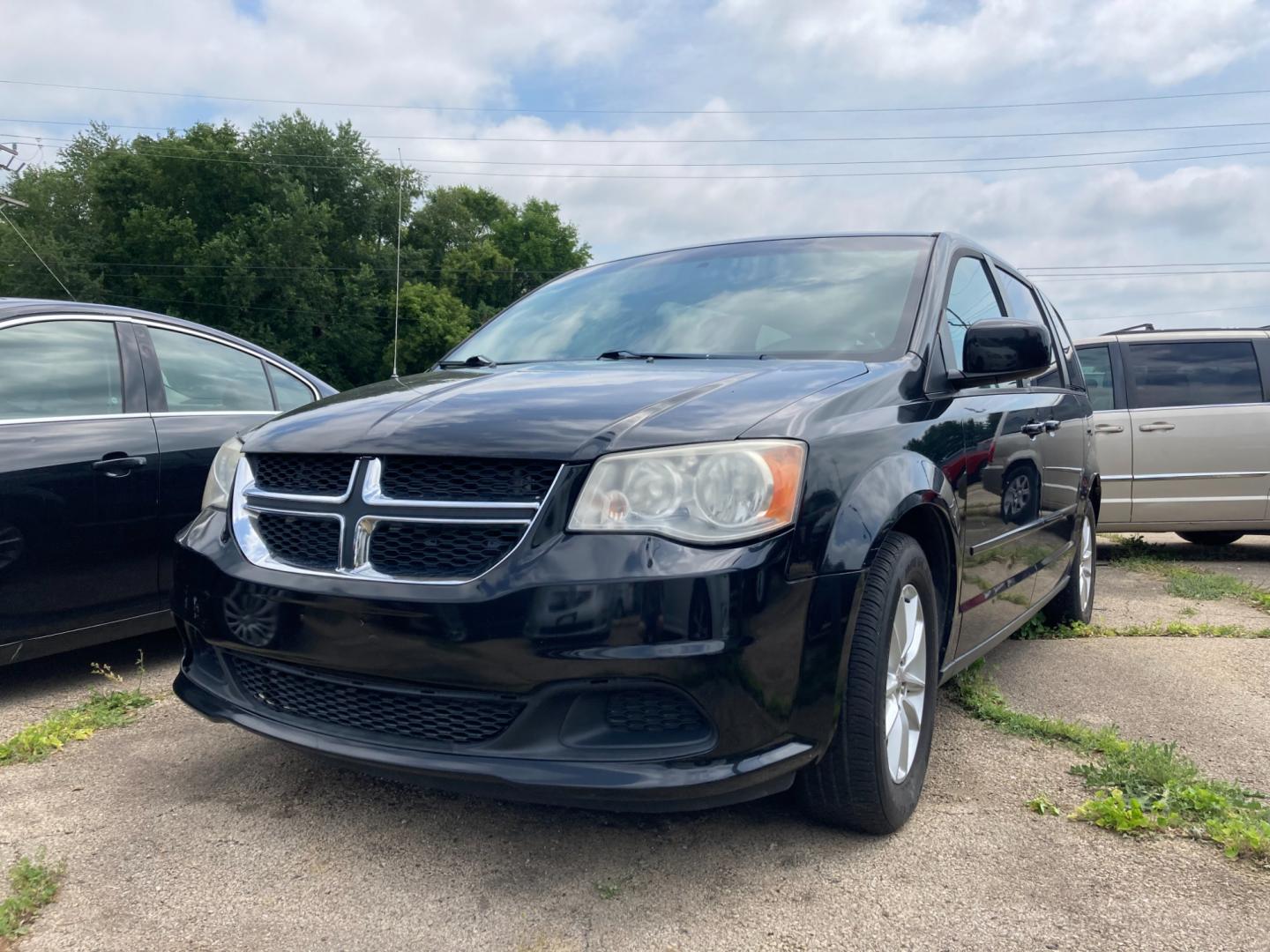 2014 Black Dodge Grand Caravan SXT (2C4RDGCG6ER) with an 3.6L V6 DOHC 24V engine, 6-Speed Automatic transmission, located at 1800 South Ihm Blvd, Freeport, IL, 61032, (815) 232-5543, 42.278645, -89.607994 - Grand Caravan SXT Wagon - Photo#0