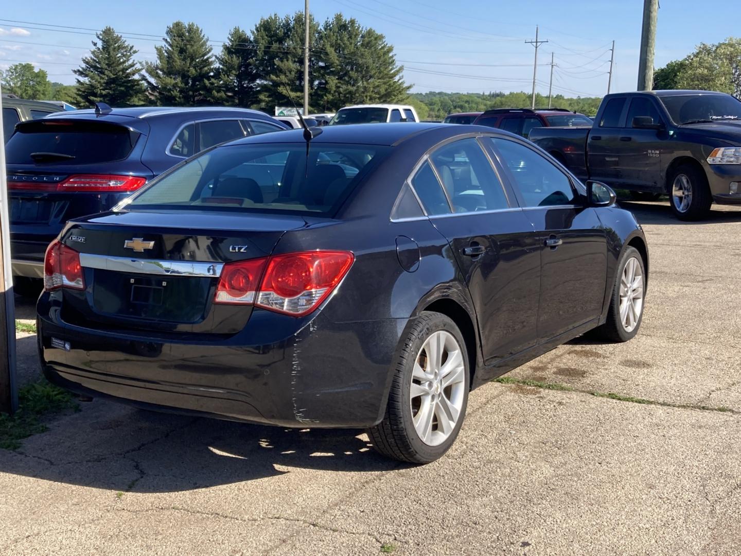 2011 Black Granite Met Chevrolet Cruze 2LT (1G1PH5S93B7) with an 1.4L L4 DOHC 16V TURBO engine, 6M transmission, located at 1800 South Ihm Blvd, Freeport, IL, 61032, (815) 232-5543, 42.278645, -89.607994 - Cruze LT 4D Sedan- Photo#1