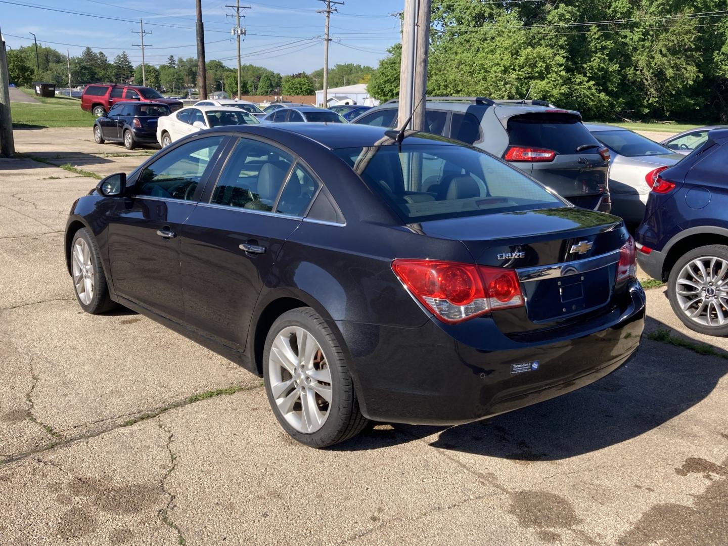 2011 Black Granite Met Chevrolet Cruze 2LT (1G1PH5S93B7) with an 1.4L L4 DOHC 16V TURBO engine, 6M transmission, located at 1800 South Ihm Blvd, Freeport, IL, 61032, (815) 232-5543, 42.278645, -89.607994 - Cruze LT 4D Sedan- Photo#2