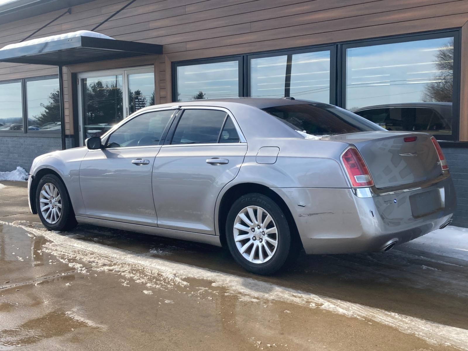 2013 Billitt Silver Chrysler 300 RWD (2C3CCAAG6DH) with an 3.6L V6 SOHC 24V engine, 8-Speed Automatic transmission, located at 1800 South Ihm Blvd, Freeport, IL, 61032, (815) 232-5543, 42.278645, -89.607994 - 300 Base 4D Sedan - Photo #2