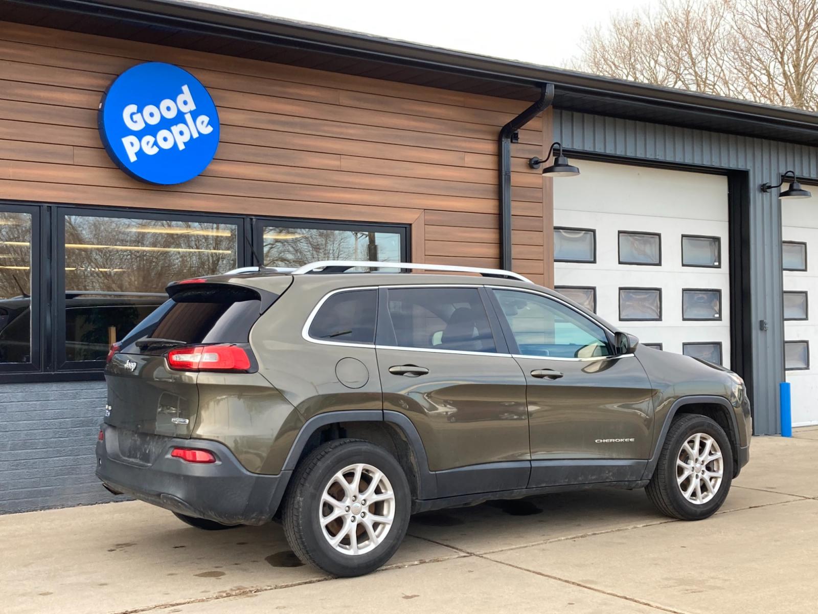 2014 Eco Green Pearl Jeep Cherokee Latitude 4WD (1C4PJMCB5EW) with an 2.4L L4 DOHC 16V engine, 9-Speed Automatic transmission, located at 1800 South Ihm Blvd, Freeport, IL, 61032, (815) 232-5543, 42.278645, -89.607994 - Cherokee Latitude 4D SUV 4WD - Photo #1