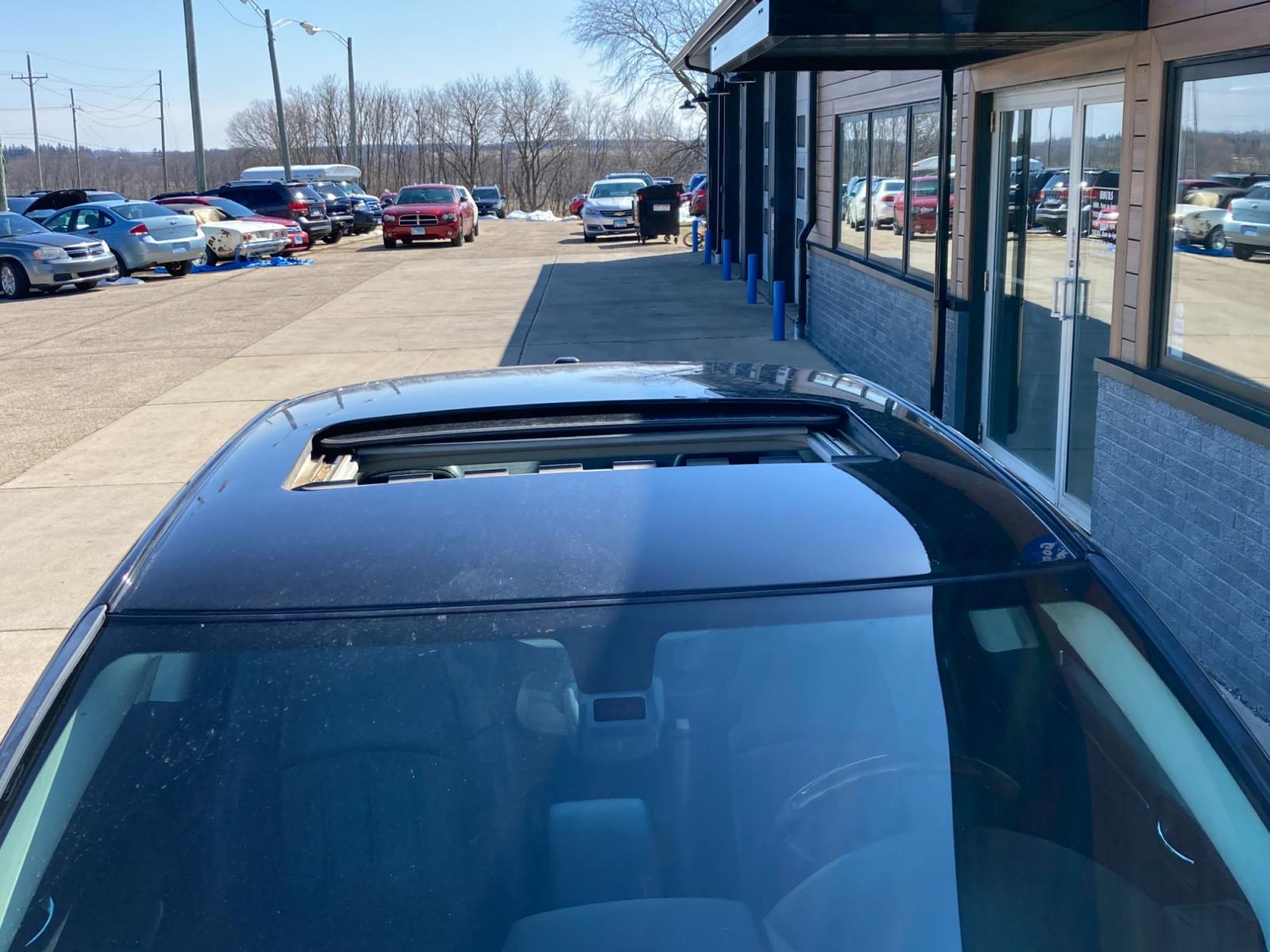 2009 Jet Black Chrysler 300 C AWD (2C3LK63T59H) with an 5.7L V8 OHV 16V engine, 5-Speed Automatic transmission, located at 1800 South Ihm Blvd, Freeport, IL, 61032, (815) 232-5543, 42.278645, -89.607994 - 300 C 4D Sedan AWD - Photo #4