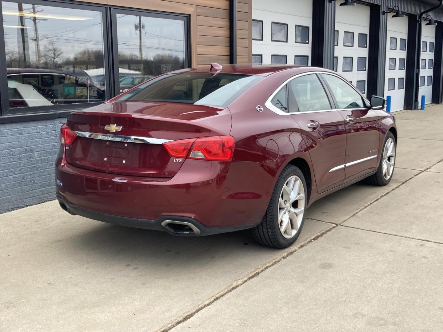2016 Siren Red Met Chevrolet Impala LTZ (2G1145S32G9) with an 3.6L V6 DOHC 24V engine, 6A transmission, located at 1800 South Ihm Blvd, Freeport, IL, 61032, (815) 232-5543, 42.278645, -89.607994 - Impala LTZ 4D Sedan V6 - Photo#1