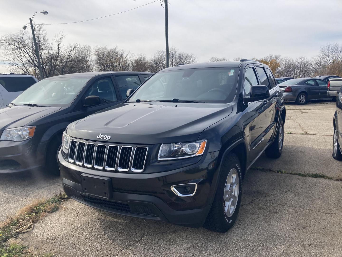 2014 Jet Black Jeep Grand Cherokee Laredo 4WD (1C4RJFAG1EC) with an 3.6L V6 DOHC 24V engine, 5-Speed Automatic transmission, located at 1800 South Ihm Blvd, Freeport, IL, 61032, (815) 232-5543, 42.278645, -89.607994 - Photo#0