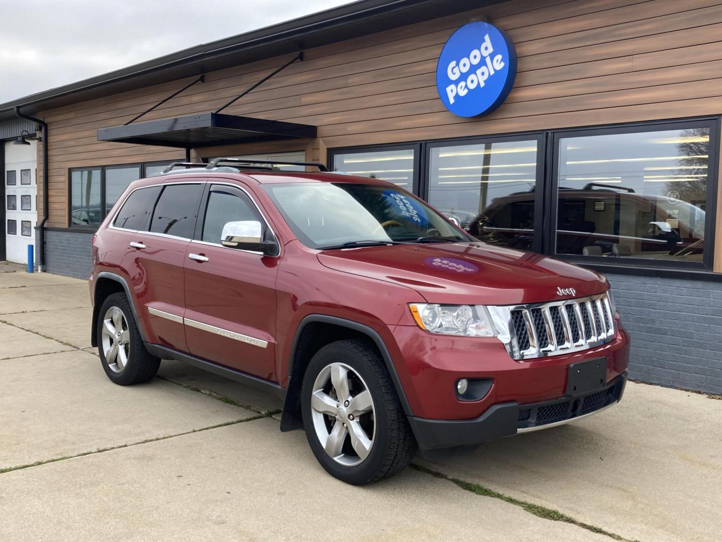 2012 Garnet Red Met. Jeep Grand Cherokee Overland 4WD (1C4RJFCT6CC) with an 5.7L V8 OHV 16V engine, 5-Speed Automatic transmission, located at 1800 South Ihm Blvd, Freeport, IL, 61032, (815) 232-5543, 42.278645, -89.607994 - Photo#0