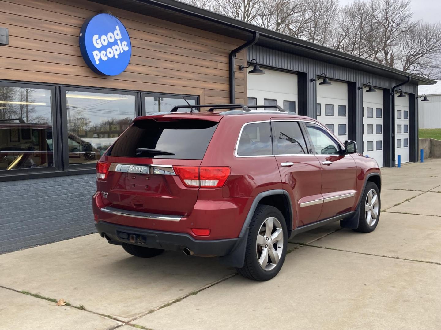 2012 Garnet Red Met. Jeep Grand Cherokee Overland 4WD (1C4RJFCT6CC) with an 5.7L V8 OHV 16V engine, 5-Speed Automatic transmission, located at 1800 South Ihm Blvd, Freeport, IL, 61032, (815) 232-5543, 42.278645, -89.607994 - Photo#1
