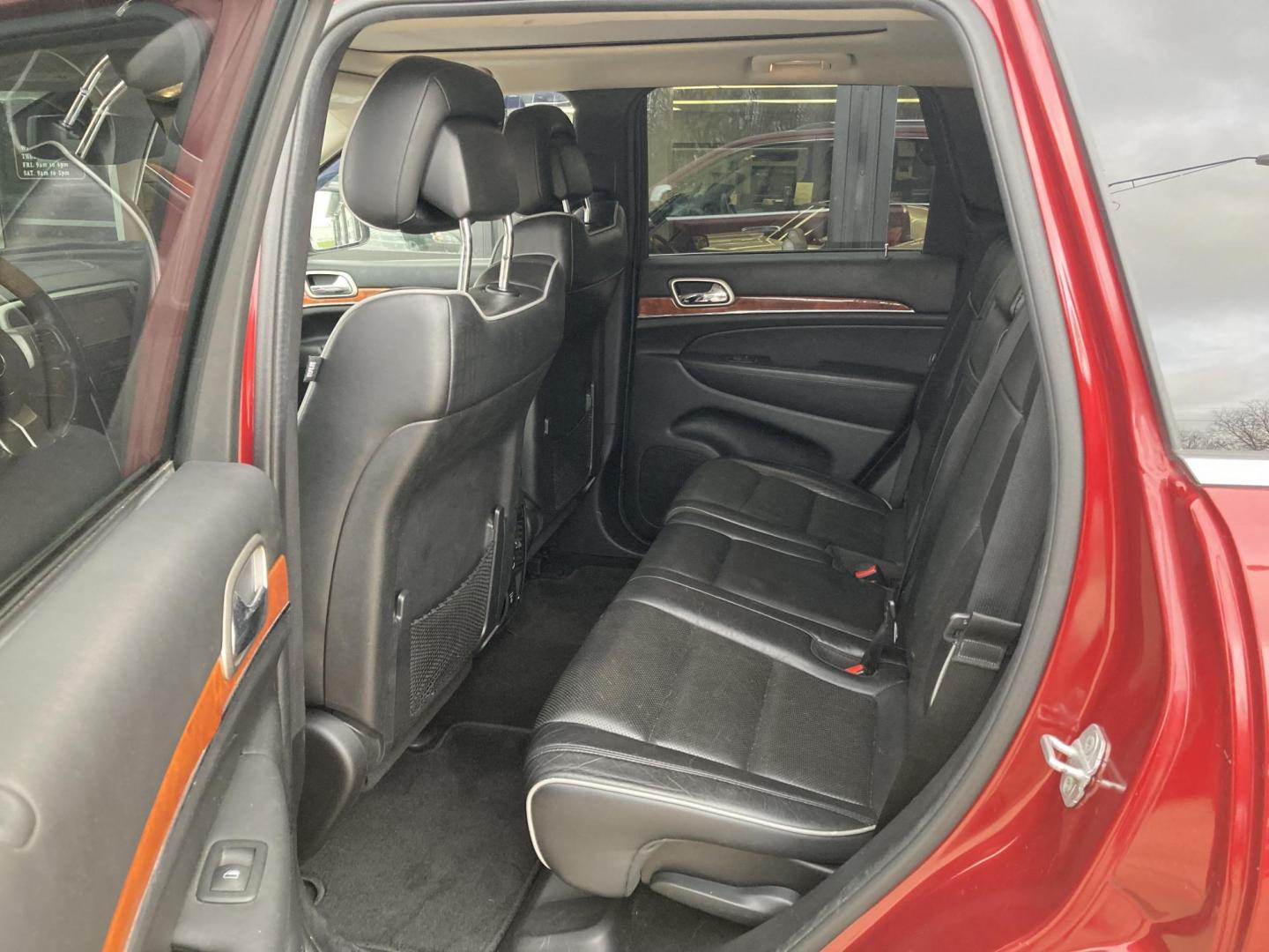 2012 Garnet Red Met. Jeep Grand Cherokee Overland 4WD (1C4RJFCT6CC) with an 5.7L V8 OHV 16V engine, 5-Speed Automatic transmission, located at 1800 South Ihm Blvd, Freeport, IL, 61032, (815) 232-5543, 42.278645, -89.607994 - Photo#7