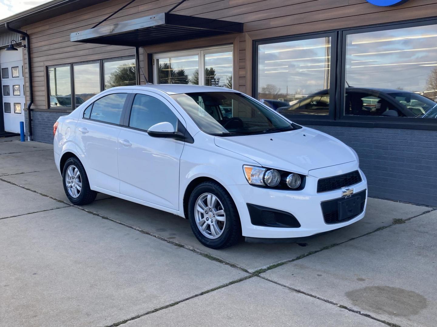 2012 Arctic White Chevrolet Sonic 2LS Sedan (1G1JA5SHXC4) with an 1.8L L4 DOHC 24V FFV engine, 6-Speed Automatic transmission, located at 1800 South Ihm Blvd, Freeport, IL, 61032, (815) 232-5543, 42.278645, -89.607994 - Photo#0