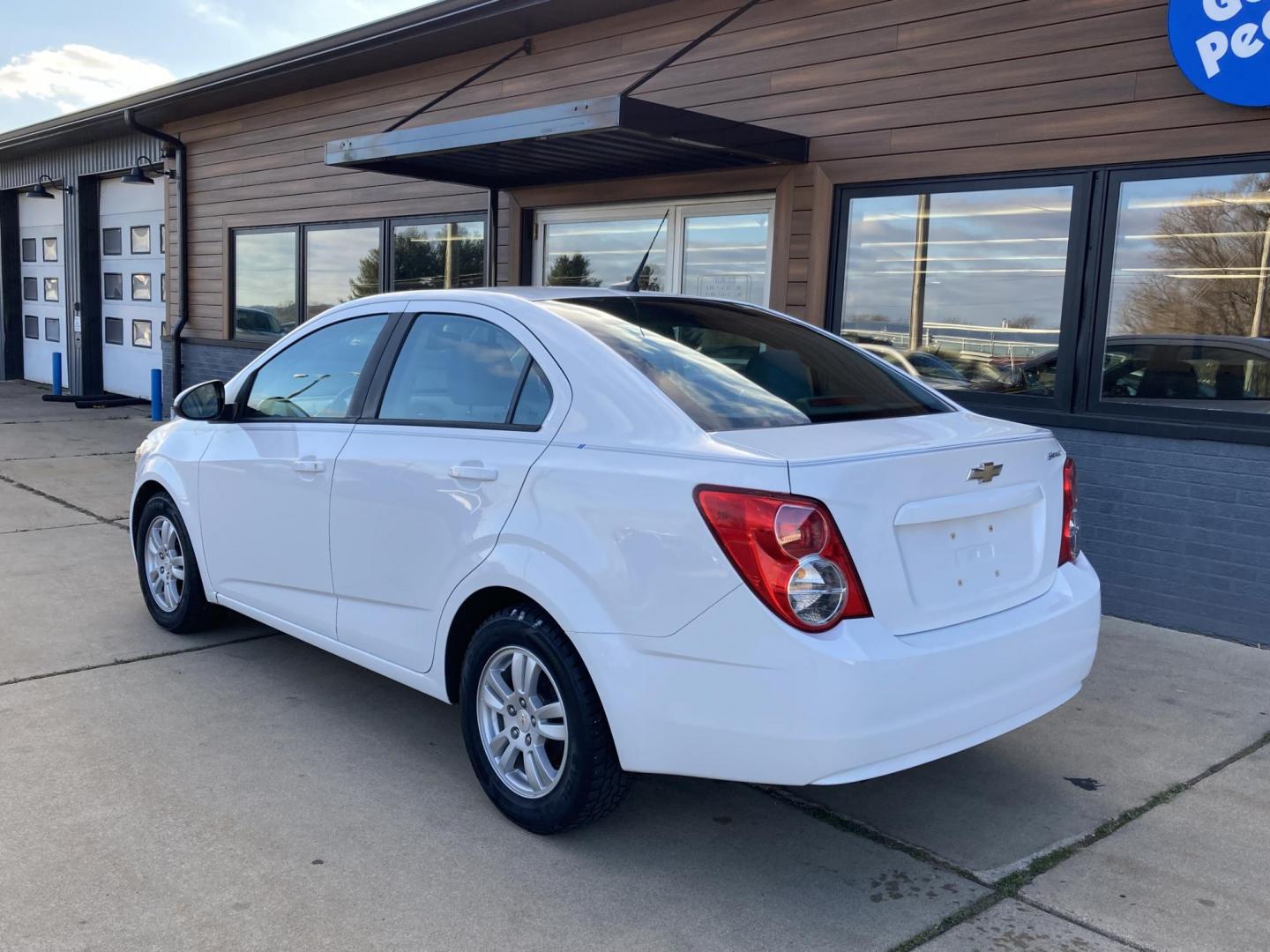 2012 Arctic White Chevrolet Sonic 2LS Sedan (1G1JA5SHXC4) with an 1.8L L4 DOHC 24V FFV engine, 6-Speed Automatic transmission, located at 1800 South Ihm Blvd, Freeport, IL, 61032, (815) 232-5543, 42.278645, -89.607994 - Photo#2
