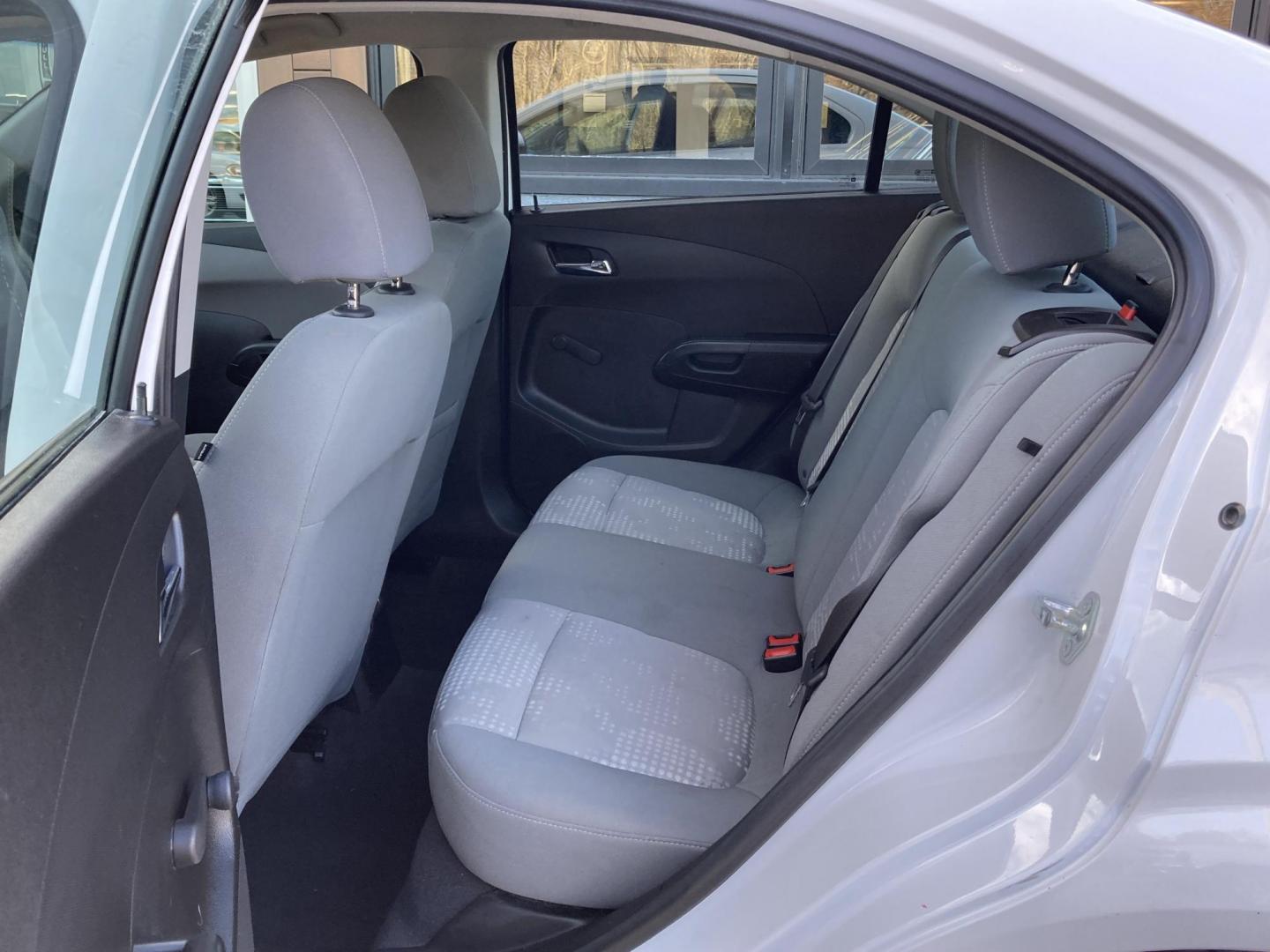 2012 Arctic White Chevrolet Sonic 2LS Sedan (1G1JA5SHXC4) with an 1.8L L4 DOHC 24V FFV engine, 6-Speed Automatic transmission, located at 1800 South Ihm Blvd, Freeport, IL, 61032, (815) 232-5543, 42.278645, -89.607994 - Photo#7
