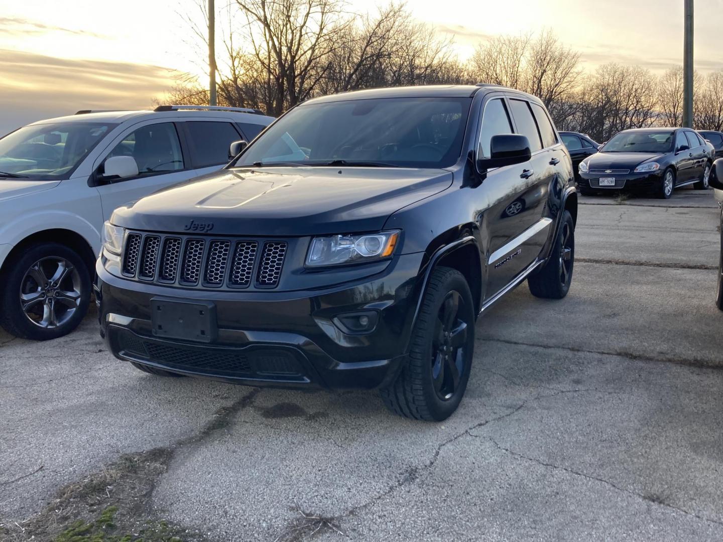 2015 Black Jeep Grand Cherokee Laredo 4WD (1C4RJFAG6FC) with an 3.6L V6 DOHC 24V engine, 8-Speed Automatic transmission, located at 1800 South Ihm Blvd, Freeport, IL, 61032, (815) 232-5543, 42.278645, -89.607994 - Photo#0