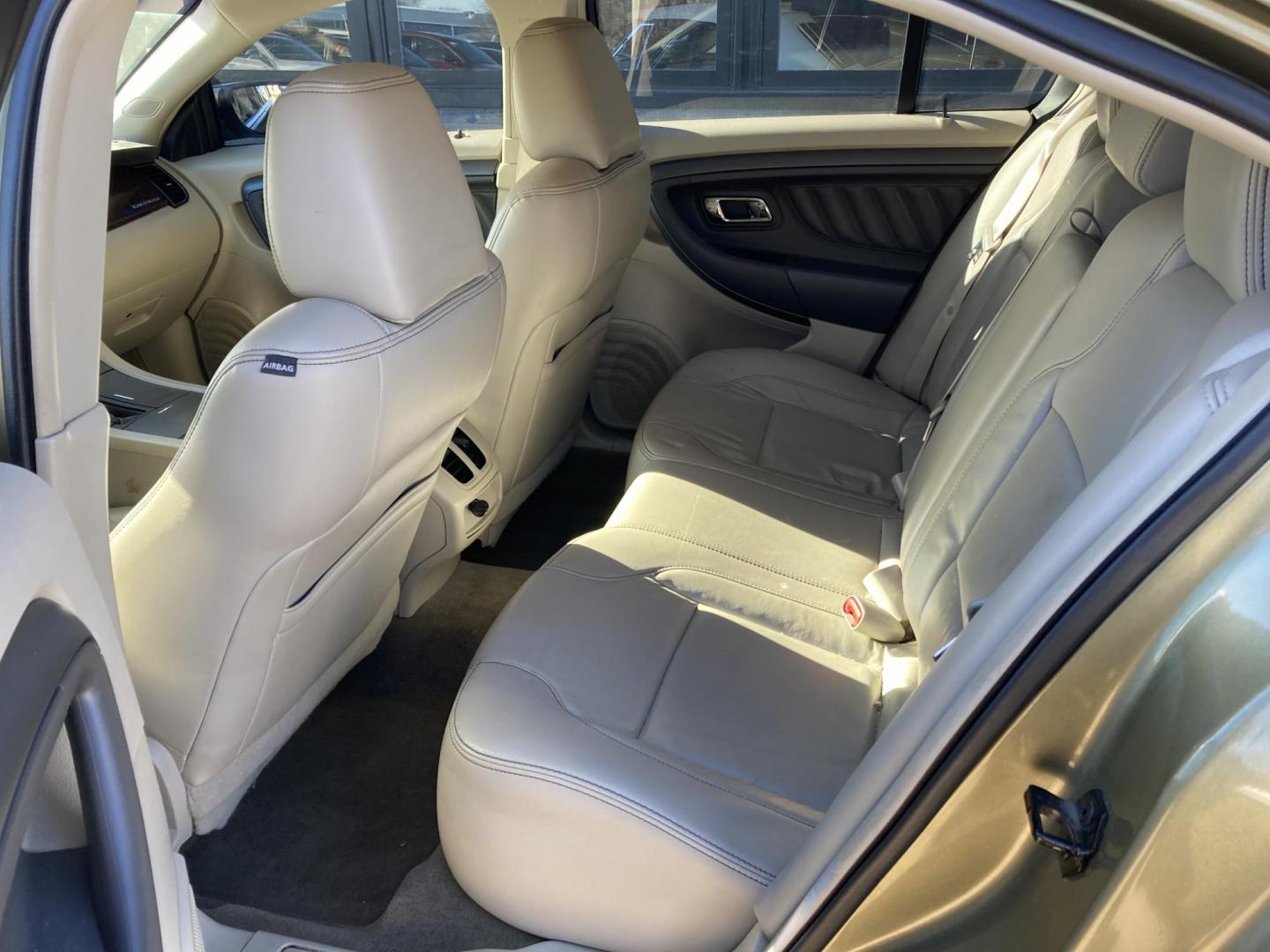 2012 Ginger Ale Met Ford Taurus SEL FWD (1FAHP2EW0CG) with an 3.5L V6 DOHC 24V engine, 6-Speed Automatic transmission, located at 1800 South Ihm Blvd, Freeport, IL, 61032, (815) 232-5543, 42.278645, -89.607994 - Photo#7