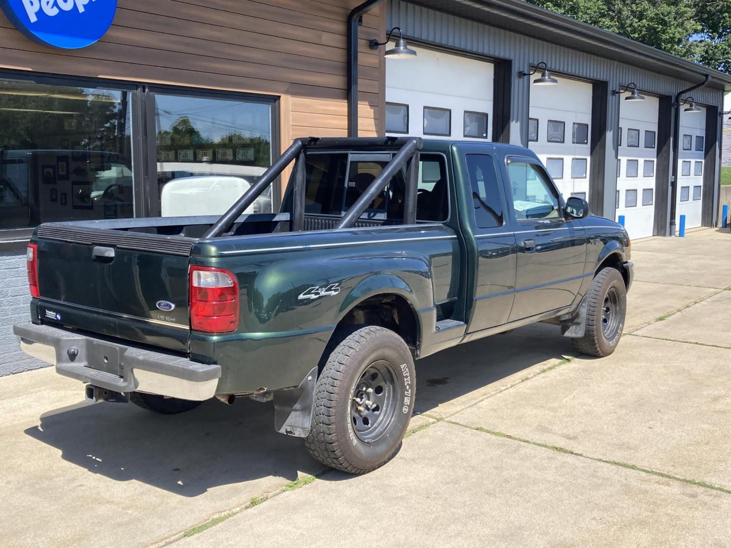 2001 Forest Green Met Ford Ranger Edge Plus SuperCab 4.0 4WD (1FTZR15E81T) with an 4.0L V6 SOHC 12V engine, 5-Speed Automatic Overdrive transmission, located at 1800 South Ihm Blvd, Freeport, IL, 61032, (815) 232-5543, 42.278645, -89.607994 - Photo#2