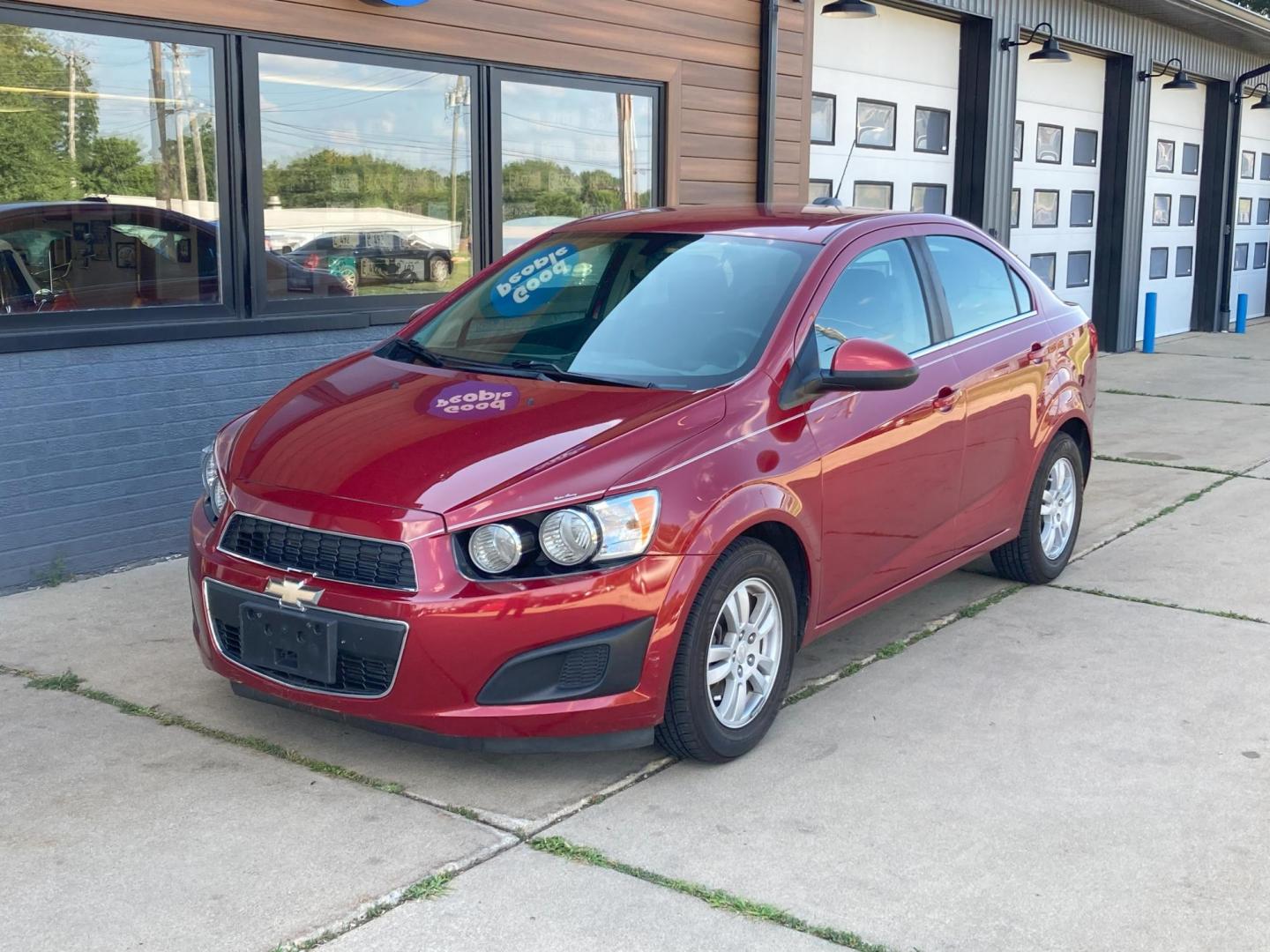 2015 Firethorn Red Met. Chevrolet Sonic LT Auto Sedan (1G1JC5SB8F4) with an 1.4L L4 DOHC 24V TURBO engine, 6-Speed Automatic transmission, located at 1800 South Ihm Blvd, Freeport, IL, 61032, (815) 232-5543, 42.278645, -89.607994 - Photo#0