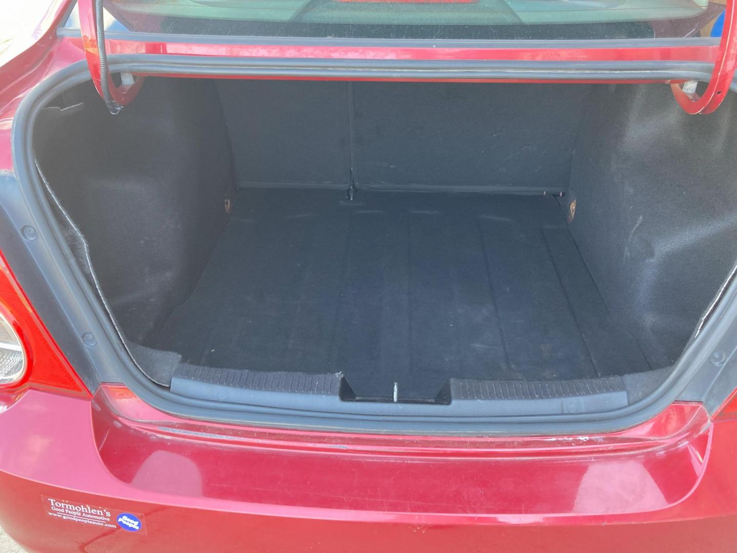 2015 Firethorn Red Met. Chevrolet Sonic LT Auto Sedan (1G1JC5SB8F4) with an 1.4L L4 DOHC 24V TURBO engine, 6-Speed Automatic transmission, located at 1800 South Ihm Blvd, Freeport, IL, 61032, (815) 232-5543, 42.278645, -89.607994 - Sonic LT 4D Sedan - Photo#8