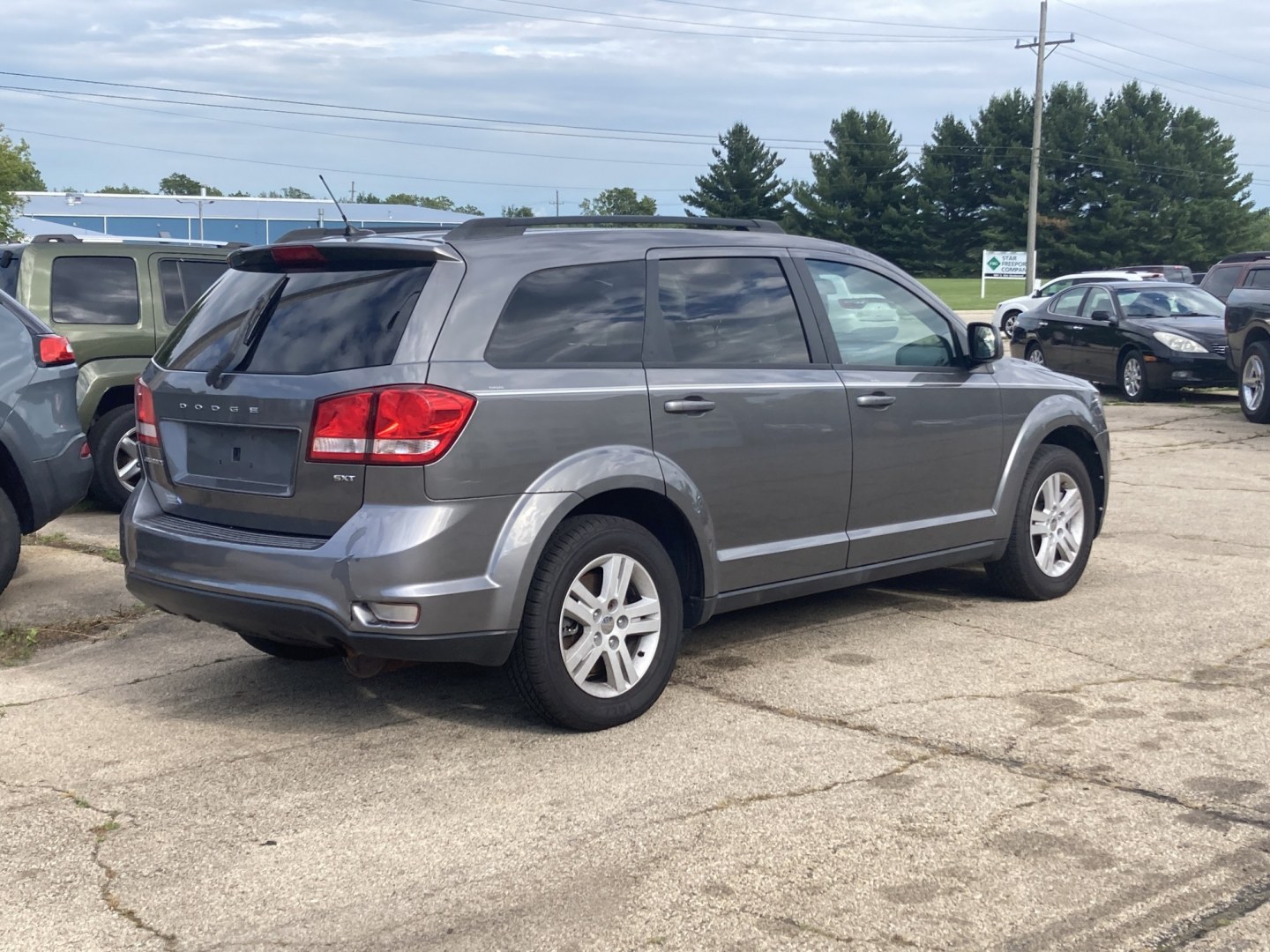 2012 Storm Gray Met Dodge Journey SXT (3C4PDCBB6CT) with an 2.4L L6 DOHC 16V engine, 4-Speed Automatic transmission, located at 1800 South Ihm Blvd, Freeport, IL, 61032, (815) 232-5543, 42.278645, -89.607994 - Journey SXT 4D SUV FWD- Photo#0