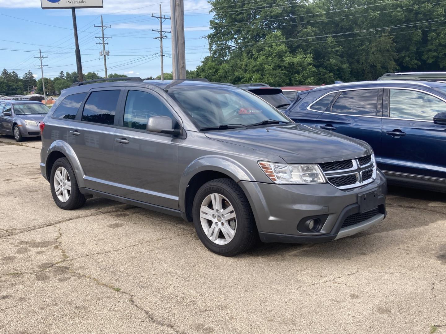 2012 Storm Gray Met Dodge Journey SXT (3C4PDCBB6CT) with an 2.4L L6 DOHC 16V engine, 4-Speed Automatic transmission, located at 1800 South Ihm Blvd, Freeport, IL, 61032, (815) 232-5543, 42.278645, -89.607994 - Journey SXT 4D SUV FWD- Photo#2