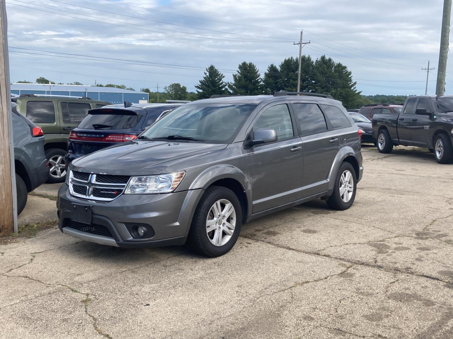 2012 Storm Gray Met Dodge Journey SXT (3C4PDCBB6CT) with an 2.4L L6 DOHC 16V engine, 4-Speed Automatic transmission, located at 1800 South Ihm Blvd, Freeport, IL, 61032, (815) 232-5543, 42.278645, -89.607994 - Journey SXT 4D SUV FWD- Photo#3