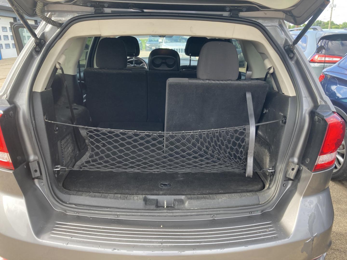 2012 Storm Gray Met Dodge Journey SXT (3C4PDCBB6CT) with an 2.4L L6 DOHC 16V engine, 4-Speed Automatic transmission, located at 1800 South Ihm Blvd, Freeport, IL, 61032, (815) 232-5543, 42.278645, -89.607994 - Journey SXT 4D SUV FWD- Photo#9