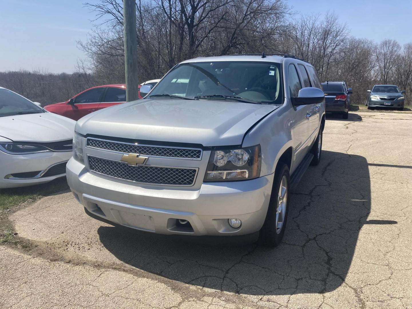 2012 Silver Met Chevrolet Suburban LTZ 1500 4WD (1GNSKKE72CR) with an 5.3L V8 OHV 16V FFV engine, 6-Speed Automatic transmission, located at 1800 South Ihm Blvd, Freeport, IL, 61032, (815) 232-5543, 42.278645, -89.607994 - Suburban 1500 LTZ 4D SUV 4WD - Photo#0