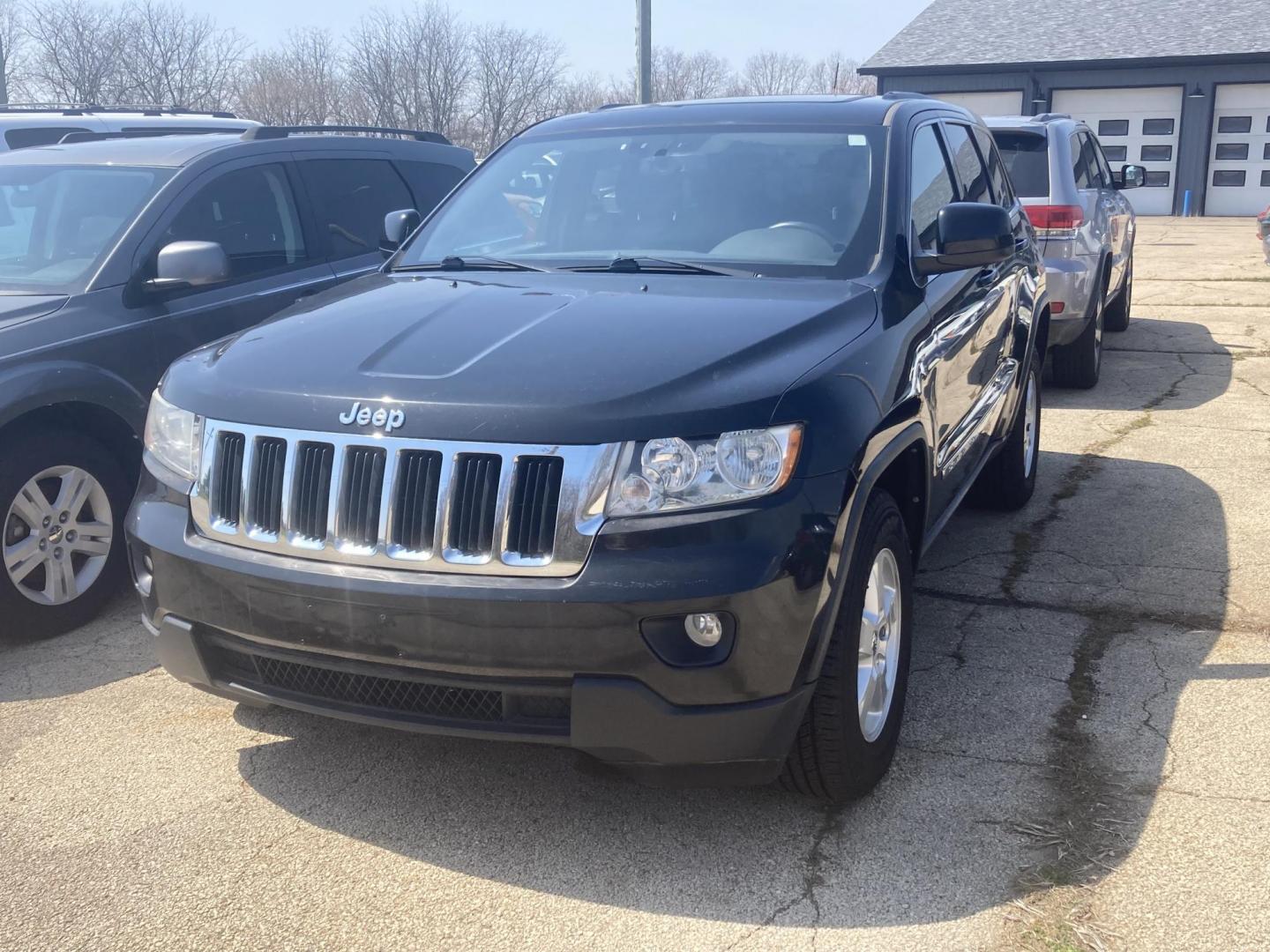 2012 Black Met Jeep Grand Cherokee Laredo 2WD (1C4RJEAG5CC) with an 3.6L V6 DOHC 24V engine, 5-Speed Automatic transmission, located at 1800 South Ihm Blvd, Freeport, IL, 61032, (815) 232-5543, 42.278645, -89.607994 - Photo#0