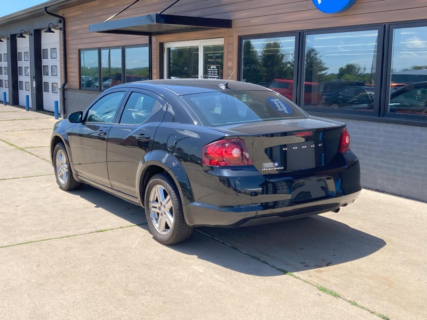 2011 Black Dodge Avenger Mainstreet (1B3BD1FB1BN) with an 2.4L L4 DOHC 16V engine, 6-Speed Automatic transmission, located at 1800 South Ihm Blvd, Freeport, IL, 61032, (815) 232-5543, 42.278645, -89.607994 - Photo#2