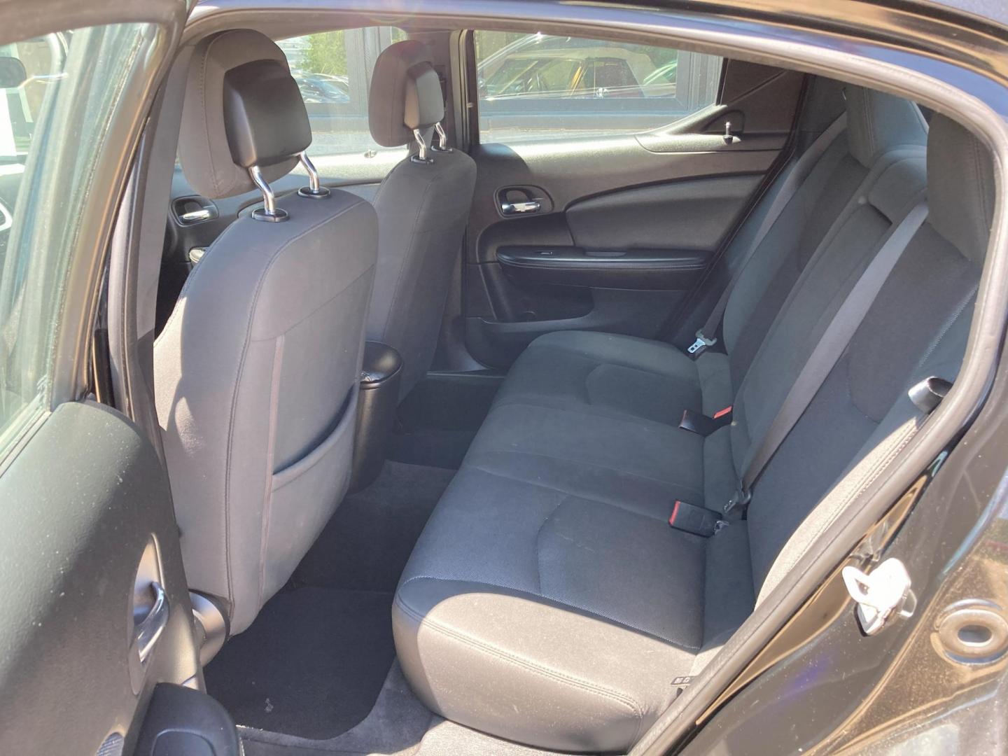 2011 Black Dodge Avenger Mainstreet (1B3BD1FB1BN) with an 2.4L L4 DOHC 16V engine, 6-Speed Automatic transmission, located at 1800 South Ihm Blvd, Freeport, IL, 61032, (815) 232-5543, 42.278645, -89.607994 - Photo#7
