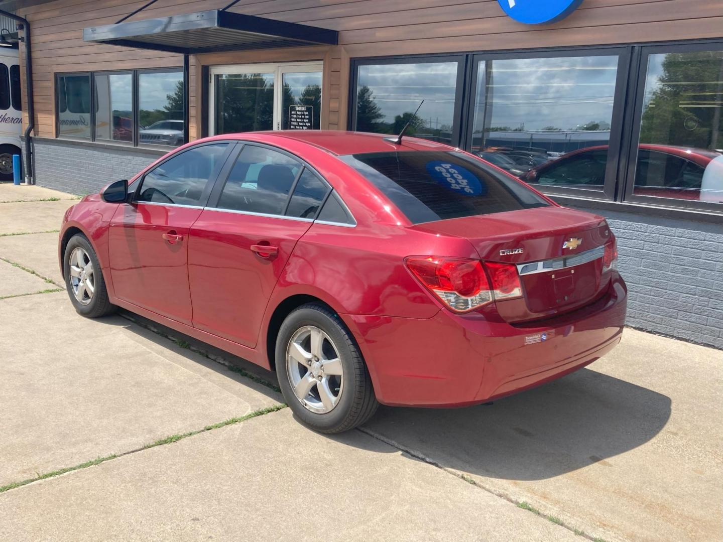 2012 Garnet Red Met Chevrolet Cruze 1LT (1G1PF5SC2C7) with an 1.4L L4 DOHC 16V TURBO engine, 6-Speed Automatic transmission, located at 1800 South Ihm Blvd, Freeport, IL, 61032, (815) 232-5543, 42.278645, -89.607994 - Photo#3