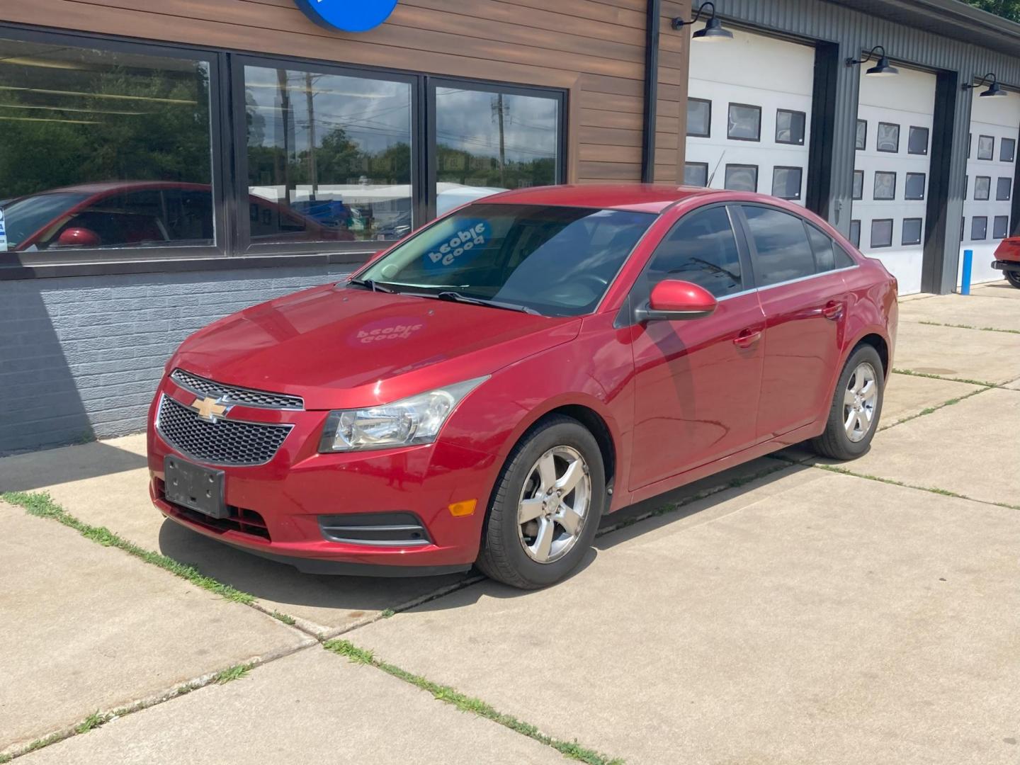 2012 Garnet Red Met Chevrolet Cruze 1LT (1G1PF5SC2C7) with an 1.4L L4 DOHC 16V TURBO engine, 6-Speed Automatic transmission, located at 1800 South Ihm Blvd, Freeport, IL, 61032, (815) 232-5543, 42.278645, -89.607994 - Photo#4