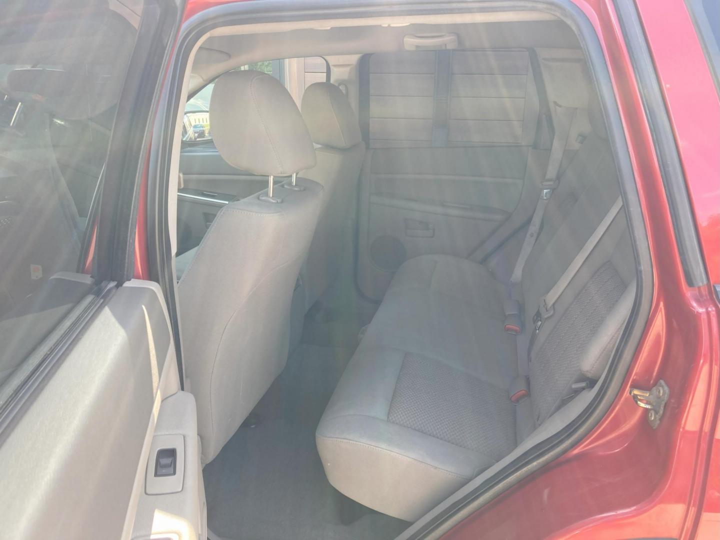 2005 Garnet Red Met. Jeep Grand Cherokee Laredo 4WD (1J4HR48N75C) with an 4.7L V8 SOHC 16V engine, 5-Speed Automatic Overdrive transmission, located at 1800 South Ihm Blvd, Freeport, IL, 61032, (815) 232-5543, 42.278645, -89.607994 - Photo#7