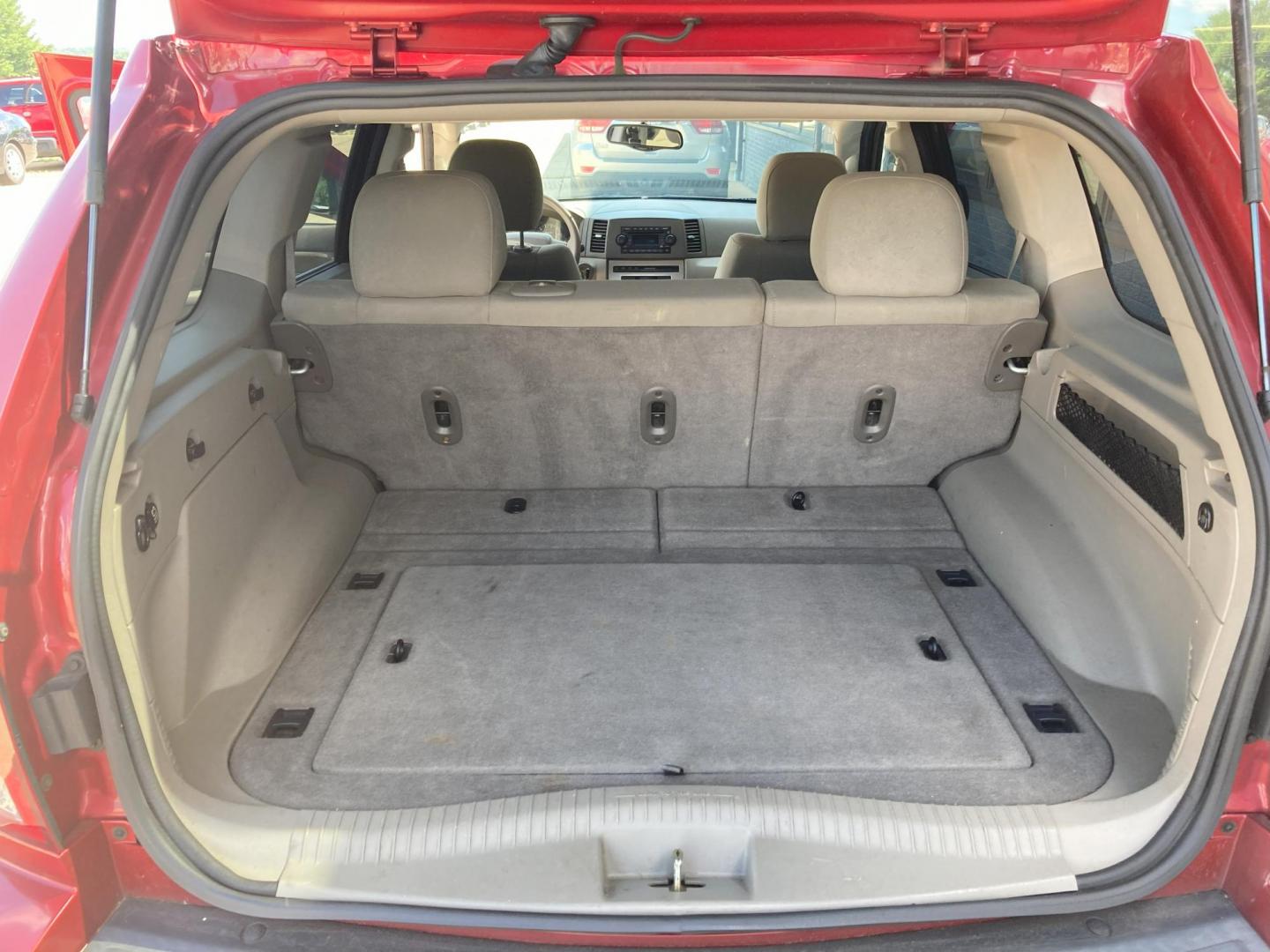 2005 Garnet Red Met. Jeep Grand Cherokee Laredo 4WD (1J4HR48N75C) with an 4.7L V8 SOHC 16V engine, 5-Speed Automatic Overdrive transmission, located at 1800 South Ihm Blvd, Freeport, IL, 61032, (815) 232-5543, 42.278645, -89.607994 - Photo#8