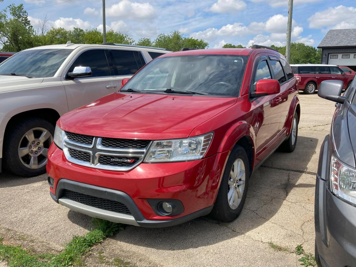 2017 Inferno Red Dodge Journey SXT (3C4PDCBG3HT) with an 3.6L V6 DOHC 24V engine, 4A transmission, located at 1800 South Ihm Blvd, Freeport, IL, 61032, (815) 232-5543, 42.278645, -89.607994 - Journey SXT 4D SUV FWD - Photo#0