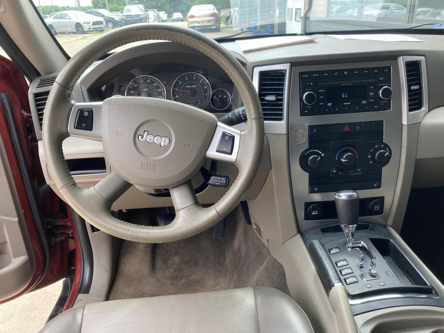 2009 Red Rock Met. Jeep Grand Cherokee Laredo 4WD (1J8GR48KX9C) with an 3.7L V6 SOHC 12V engine, 5-Speed Automatic transmission, located at 1800 South Ihm Blvd, Freeport, IL, 61032, (815) 232-5543, 42.278645, -89.607994 - Grand Cherokee Laredo 4D SUV 4WD - Photo#5