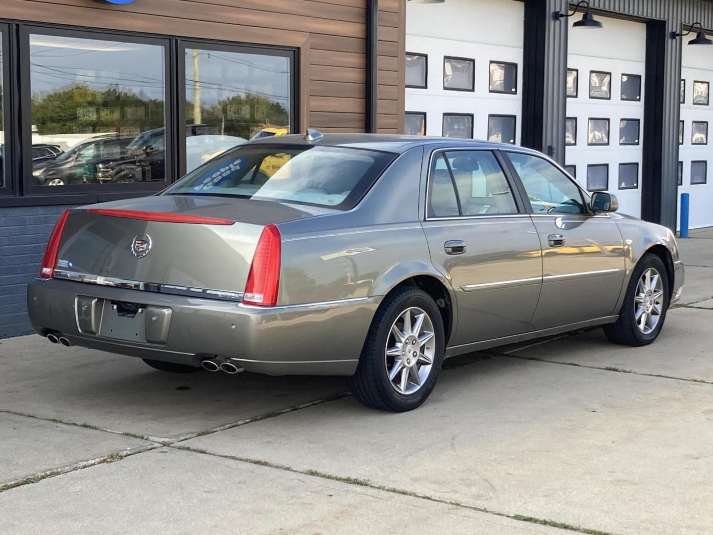 2010 Tuscan Bronze Met Cadillac DTS Luxury (1G6KD5EY0AU) with an 4.6L V8 DOHC 32V engine, 4-Speed Automatic transmission, located at 1800 South Ihm Blvd, Freeport, IL, 61032, (815) 232-5543, 42.278645, -89.607994 - Photo#1