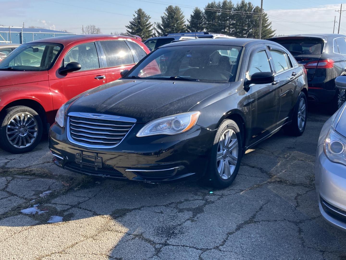 2013 Black Chrysler 200 LX (1C3CCBAB6DN) with an 2.4L L4 DOHC 16V engine, 6-Speed Automatic transmission, located at 1800 South Ihm Blvd, Freeport, IL, 61032, (815) 232-5543, 42.278645, -89.607994 - 200 LX 4D Sedan - Photo#0