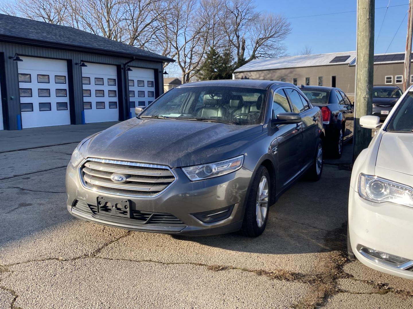 2013 Dark Sable Gray Ford Taurus SEL FWD (1FAHP2E84DG) with an 3.5L V6 DOHC 24V engine, 6-Speed Automatic transmission, located at 1800 South Ihm Blvd, Freeport, IL, 61032, (815) 232-5543, 42.278645, -89.607994 - Photo#0