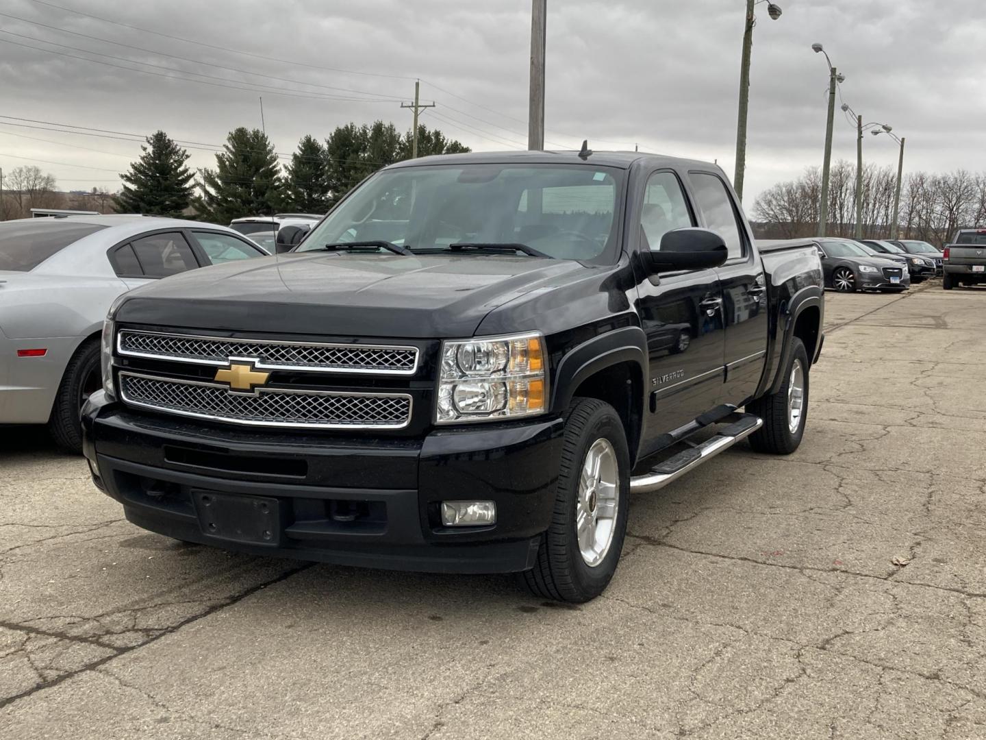 2012 Black Chevrolet Silverado 1500 LTZ Crew Cab 4WD (1GCPKTE76CF) with an 5.3L V8 OHV 16V FFV engine, 6-Speed Automatic transmission, located at 1800 South Ihm Blvd, Freeport, IL, 61032, (815) 232-5543, 42.278645, -89.607994 - Silverado 1500 LTZ Crew Cab 4WD - Photo#0