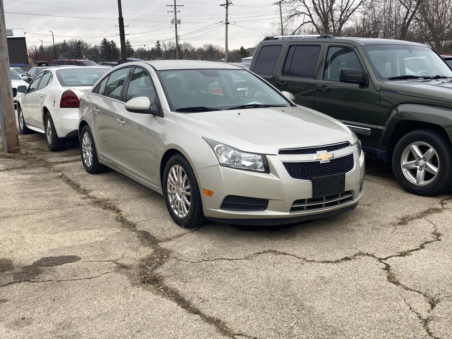 2013 Harvest Gold Met Chevrolet Cruze ECO Auto (1G1PH5SB4D7) with an 1.4L L4 DOHC 16V TURBO engine, 6-Speed Automatic transmission, located at 1800 South Ihm Blvd, Freeport, IL, 61032, (815) 232-5543, 42.278645, -89.607994 - Photo#0